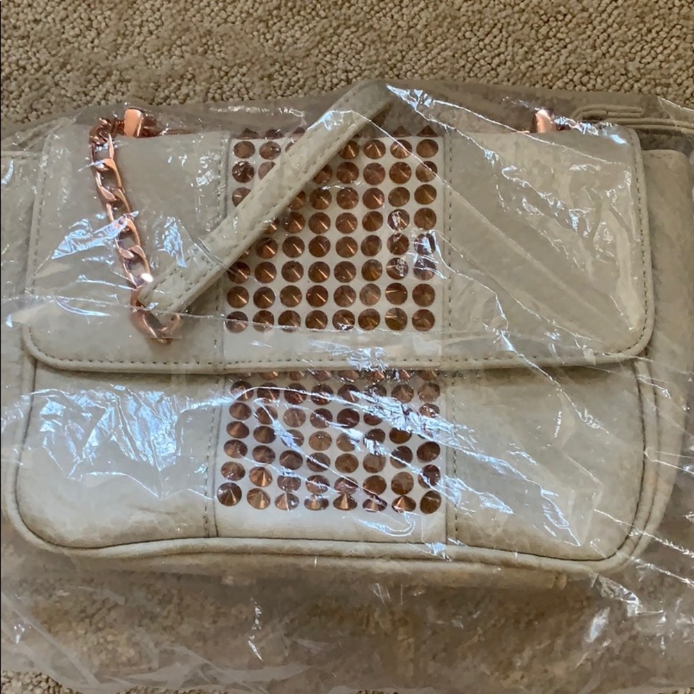 crossbody bag never used! Still in packaging